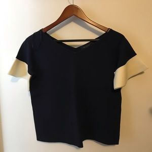 Blue short sleeve shirt with white sleeves